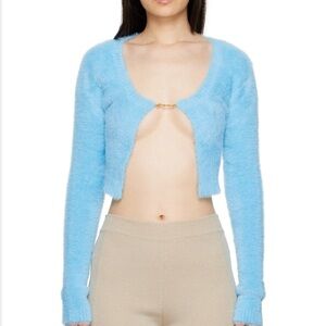 Jacquemus cardigan with gold logo charm